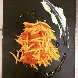 Pasta fresca con pomodorino e ricotta infornata al basilico